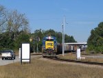 CSX 8349 leads a train across Raleigh Street